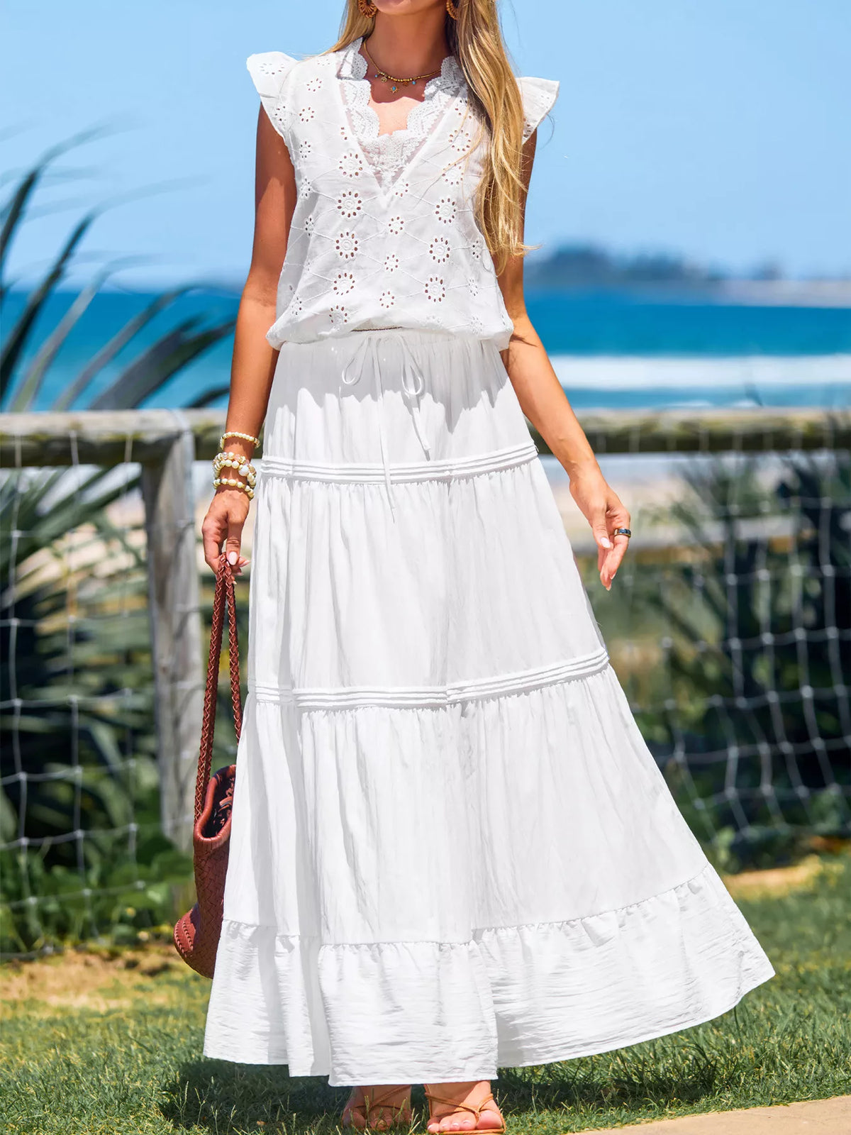 white flowy tiered drawstring maxi skirt fabric and print detail