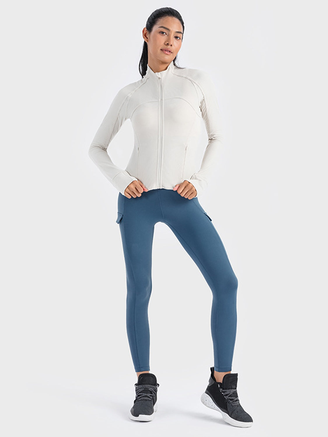 Zip up long sleeve sports jacket close up fabric detail