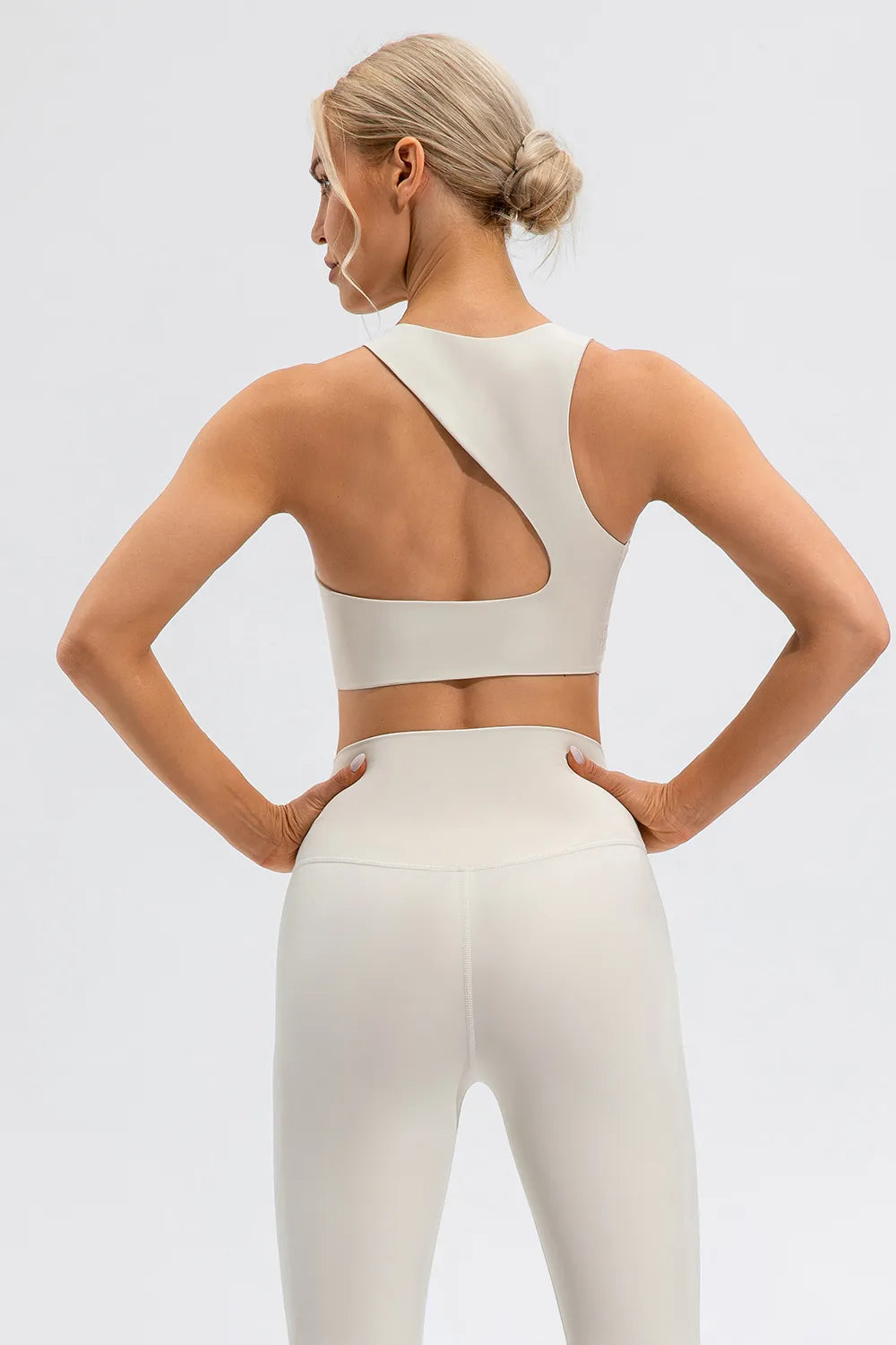 Round Neck Cutout Cropped Active Tank styled on model 11