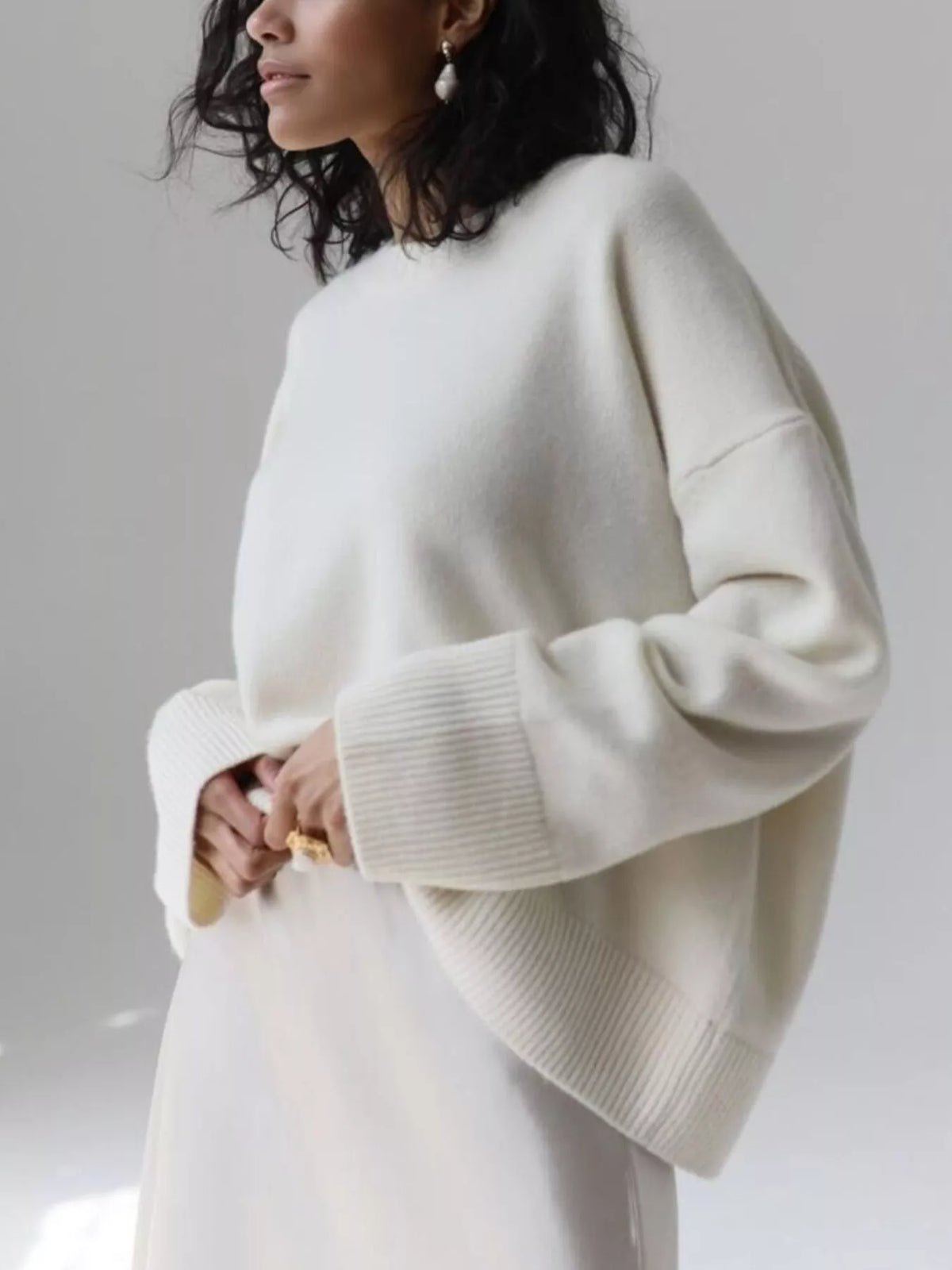 Ribbed hem round neck pullover sweater sleeve view
