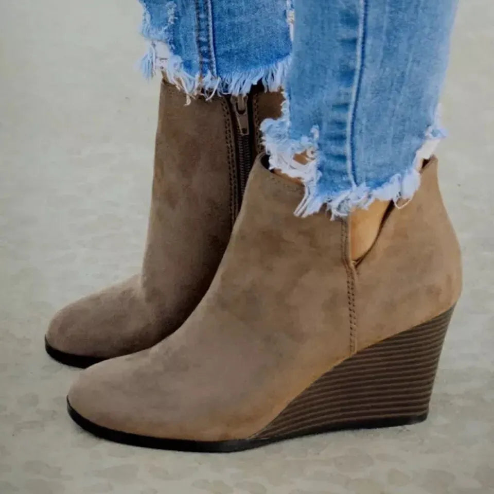 Khaki high heel ankle boots with side zip back heel view