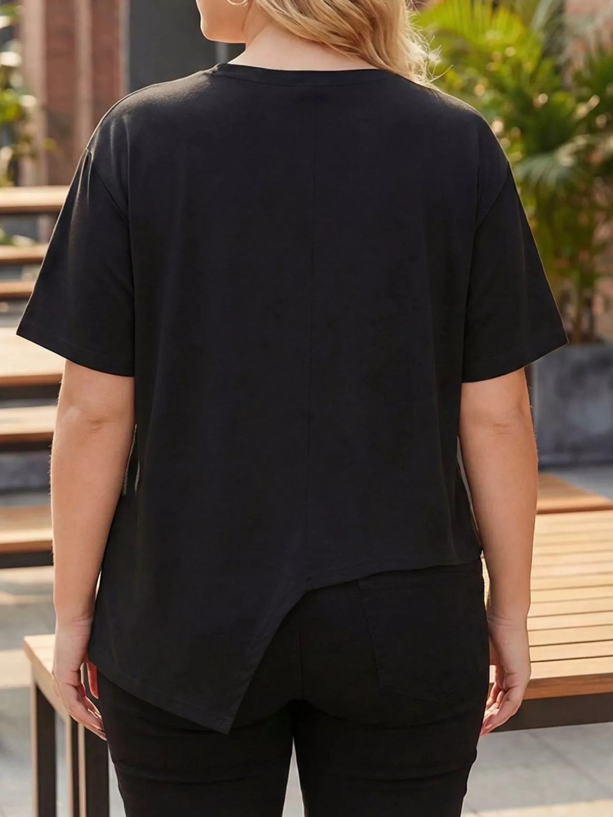 Black asymmetrical t-shirt styled everyday casual look
