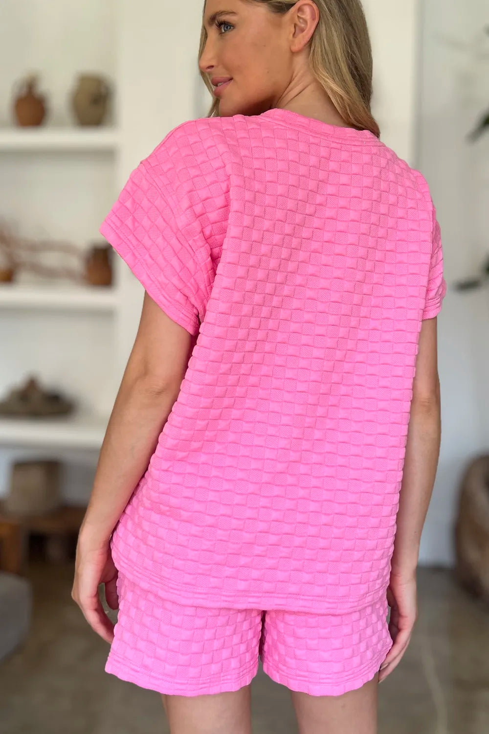 Textured fabric detail of the matching set