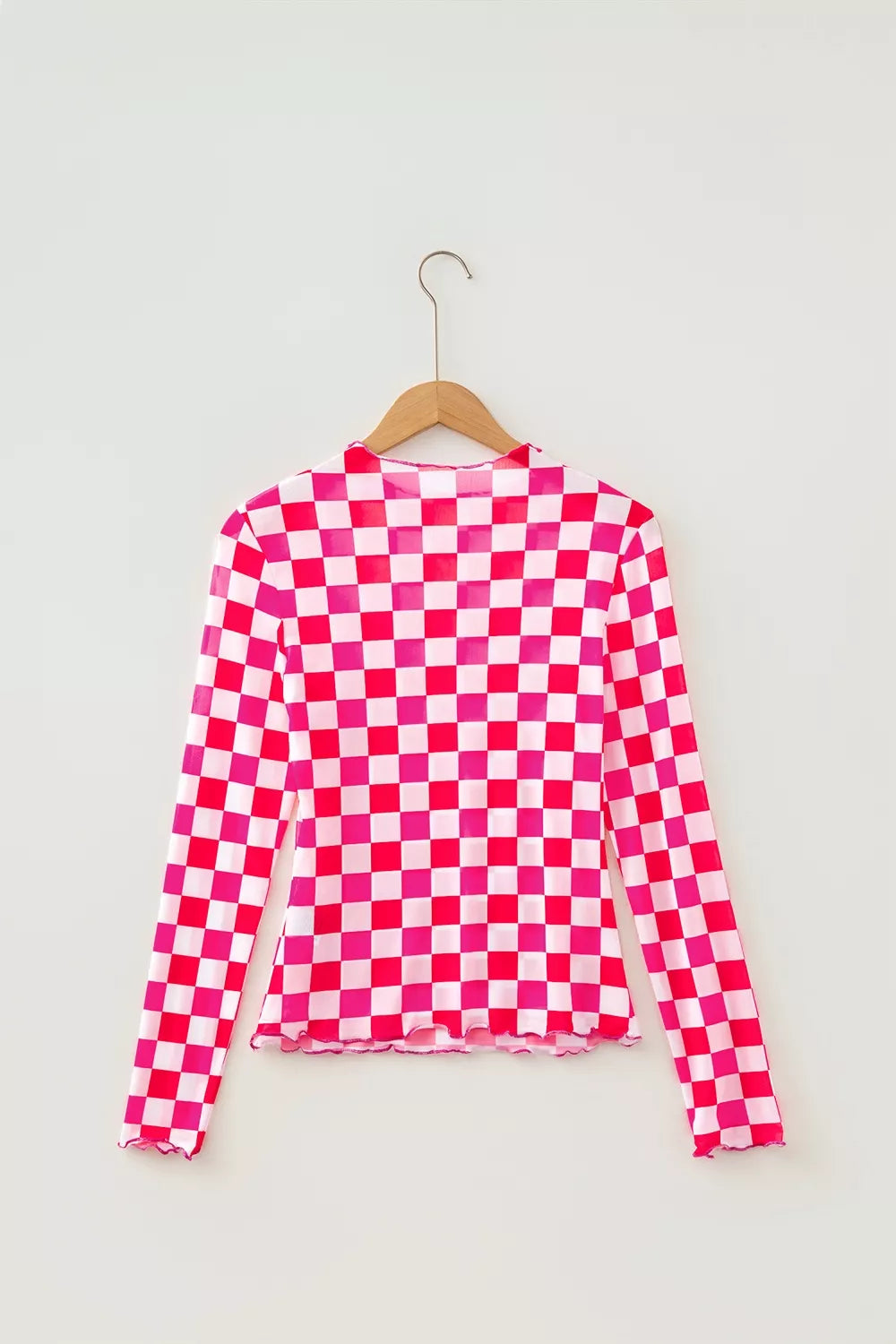 Side view of plaid heart mesh top