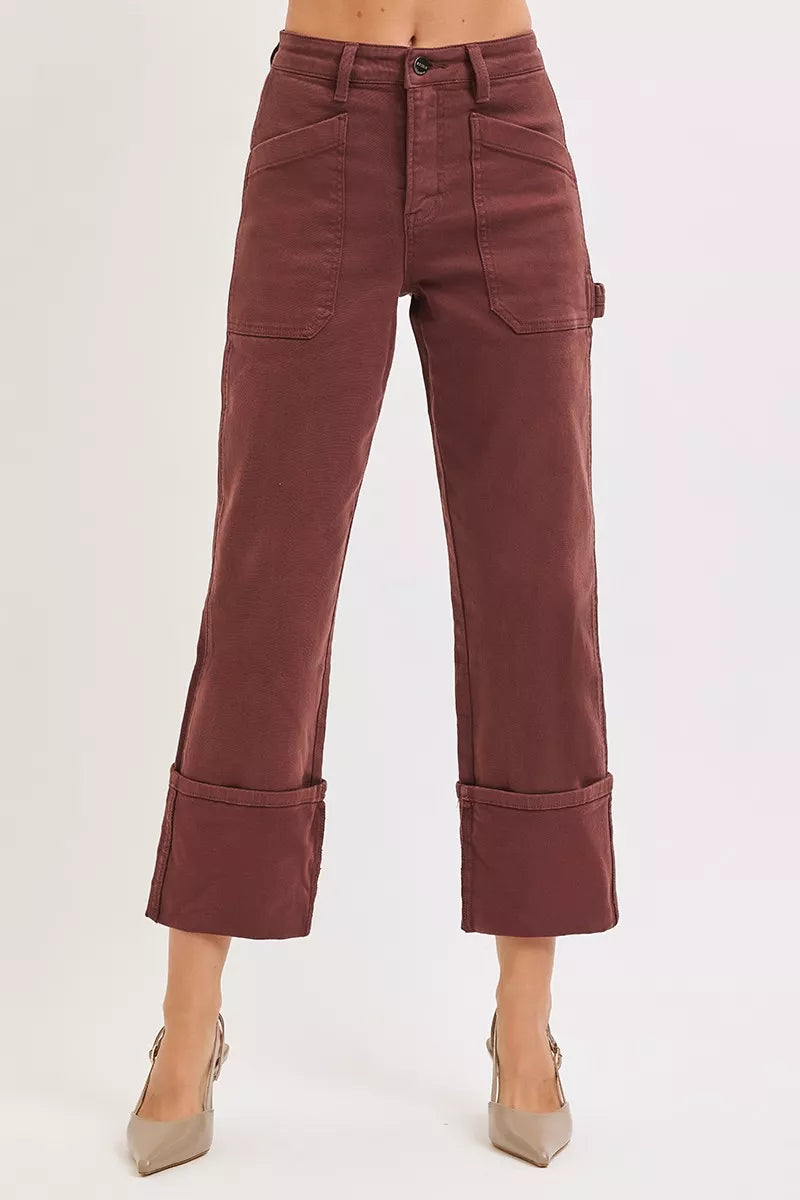 Carpenter pocket detail on brown high rise jeans