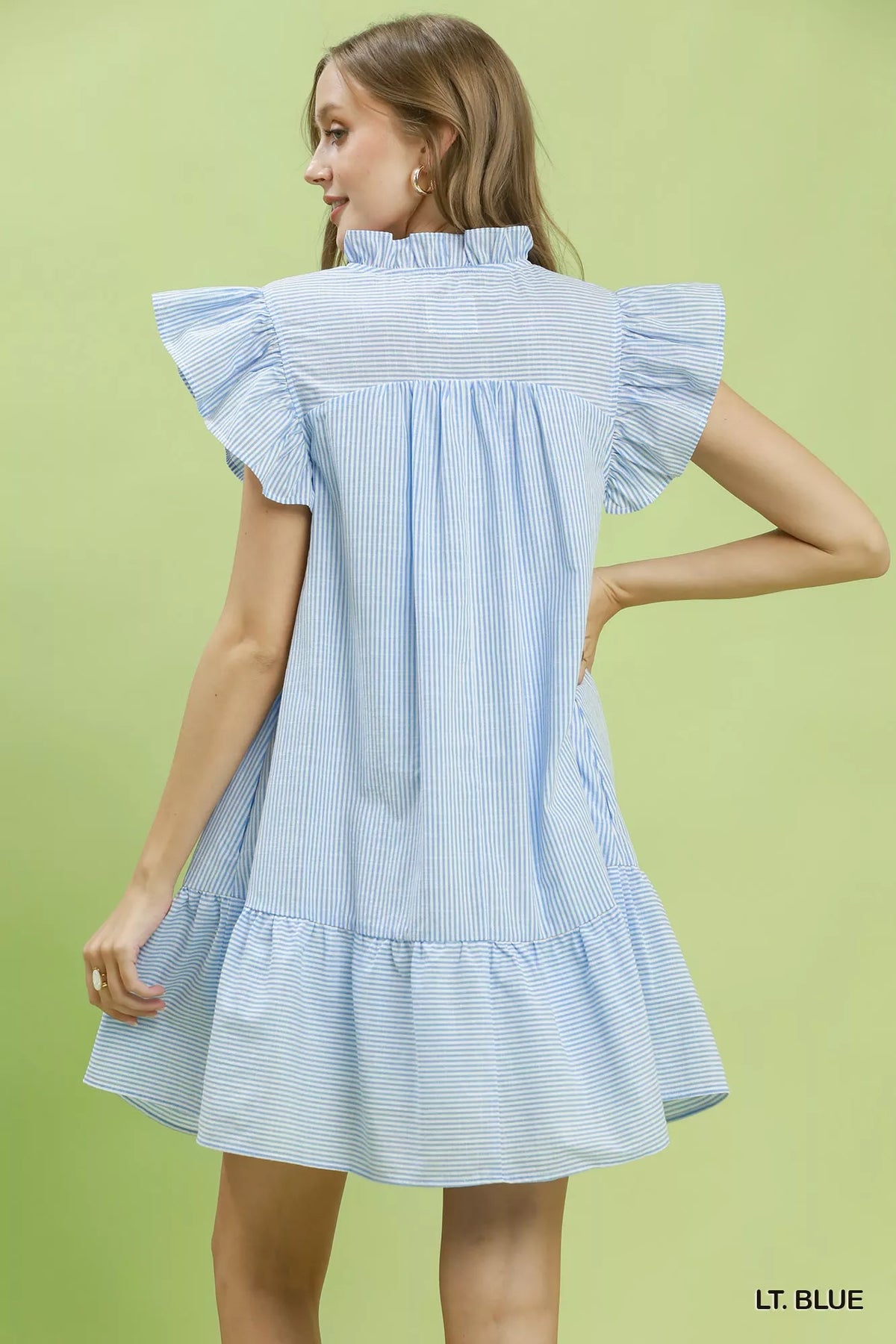 Light blue striped smocked yoke ruffle dress side view