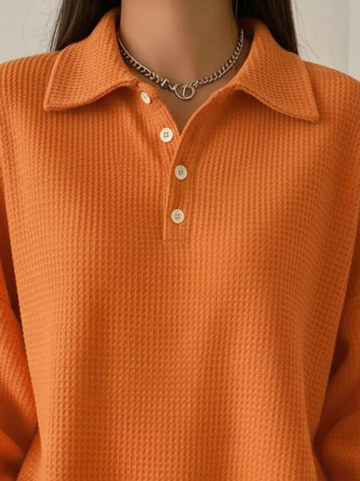 Button front detail on waffle knit top