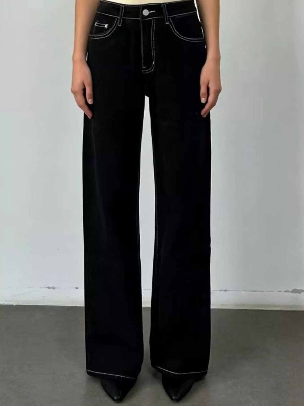 Wide leg washed jeans styled full length