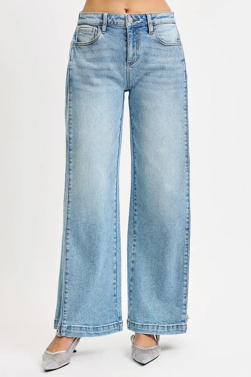 Close up of adjustable snap closure at jean hem