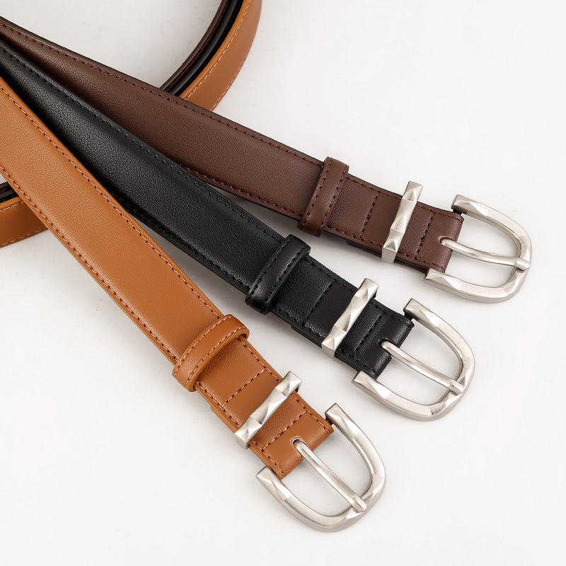 Classic leather skinny belt coiled front view