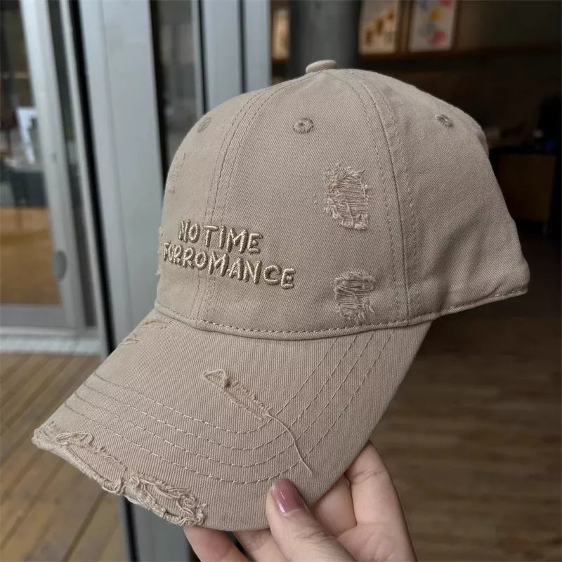 Worn in embroidered cap angled view