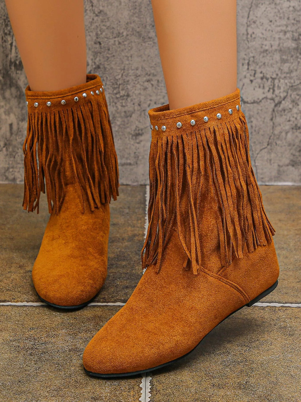 Studded fringe boots sole and tread