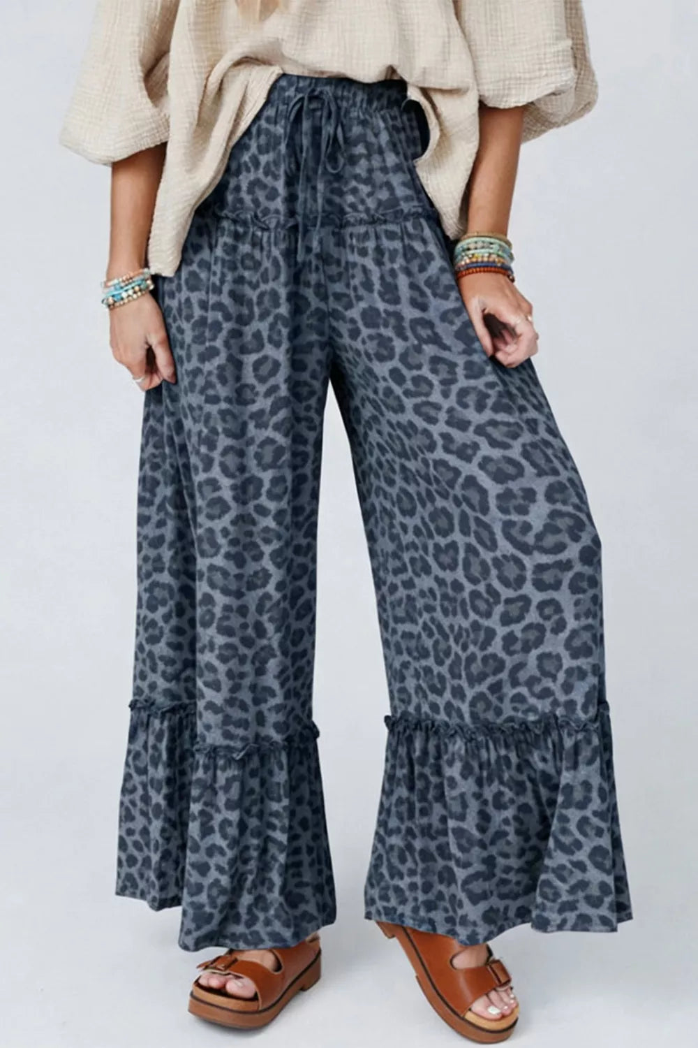Leopard print drawstring wide leg pants front view