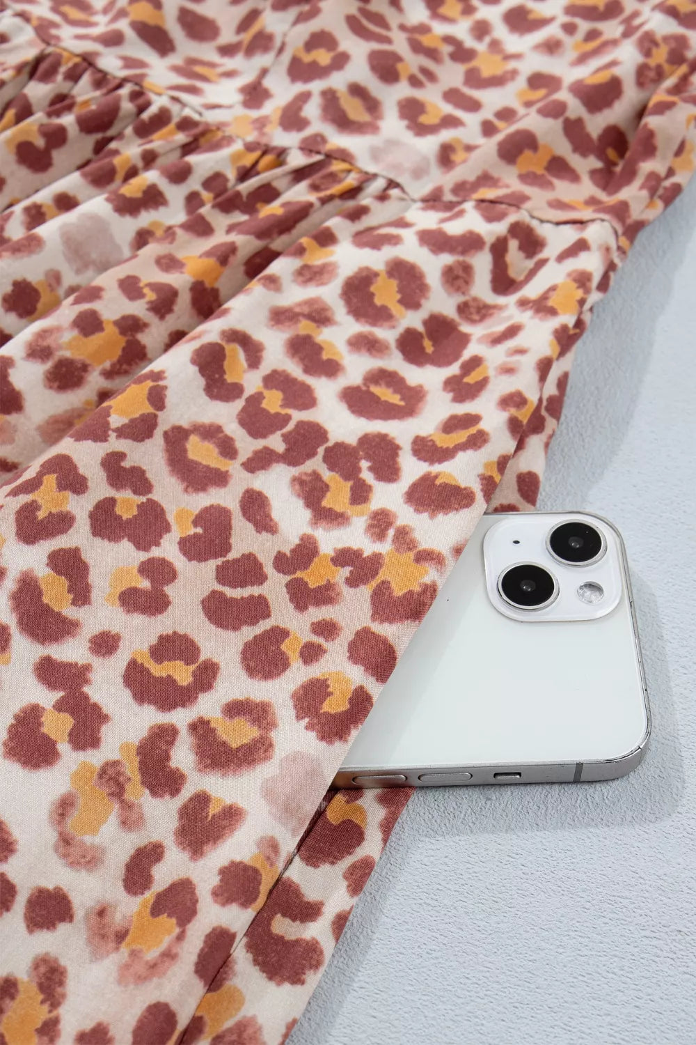 Leopard print viscose short dress fabric close up