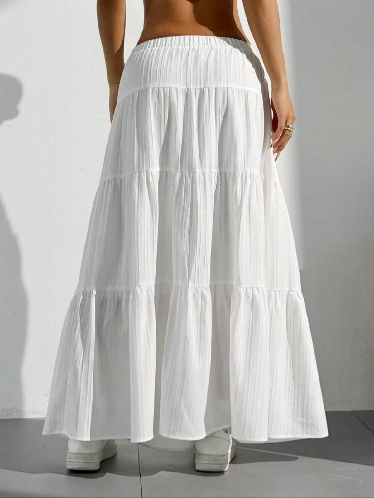 Ruched waist detail of maxi skirt