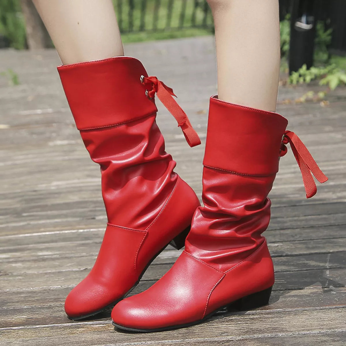 Round toe block heel boots toe close up