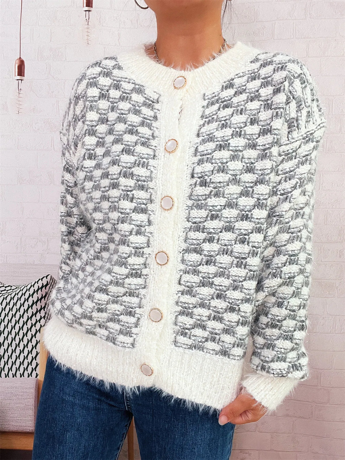 Fluffy textured button up cardigan close up detail