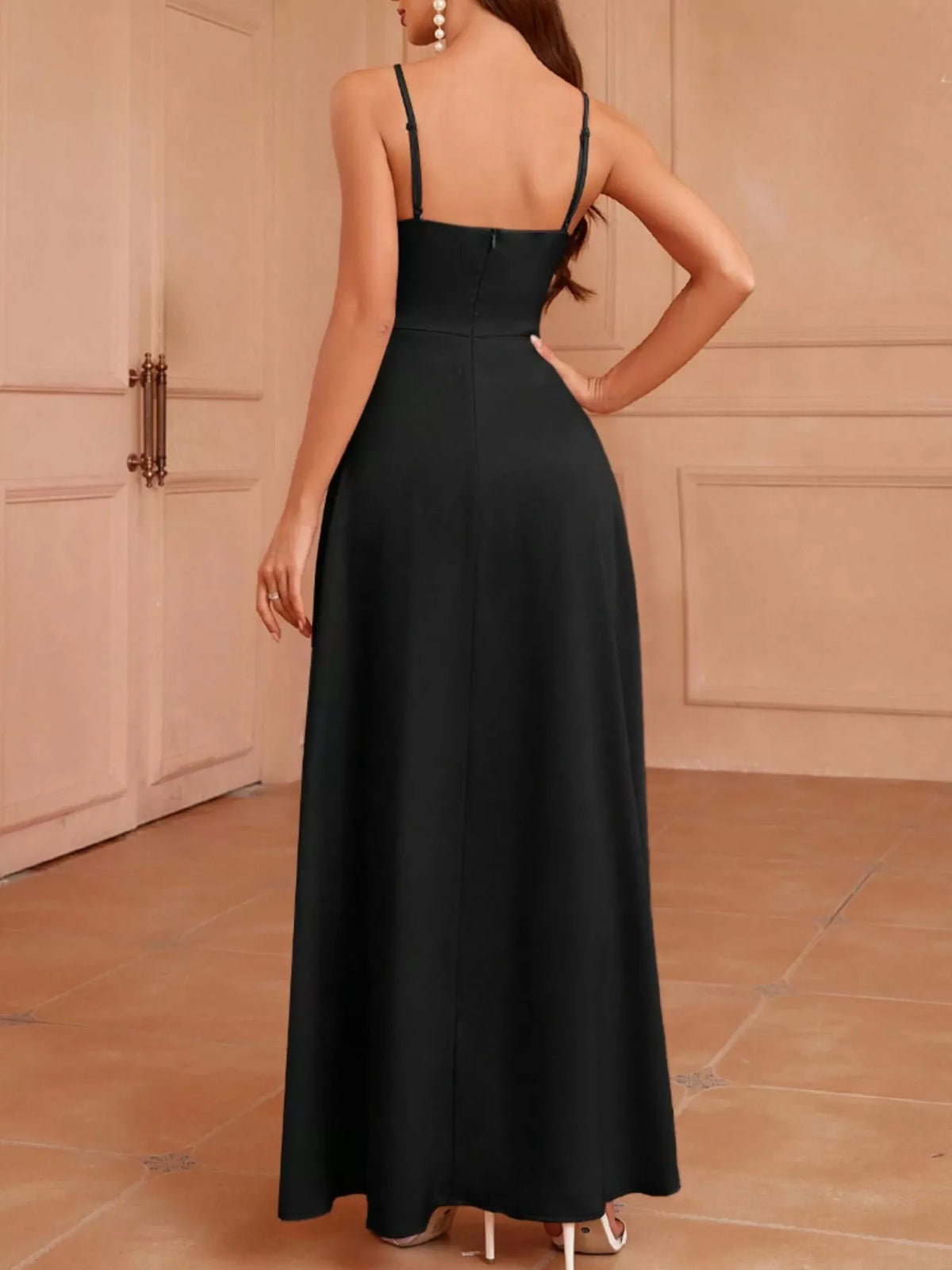 Back view of the spaghetti strap dress showing the zipper