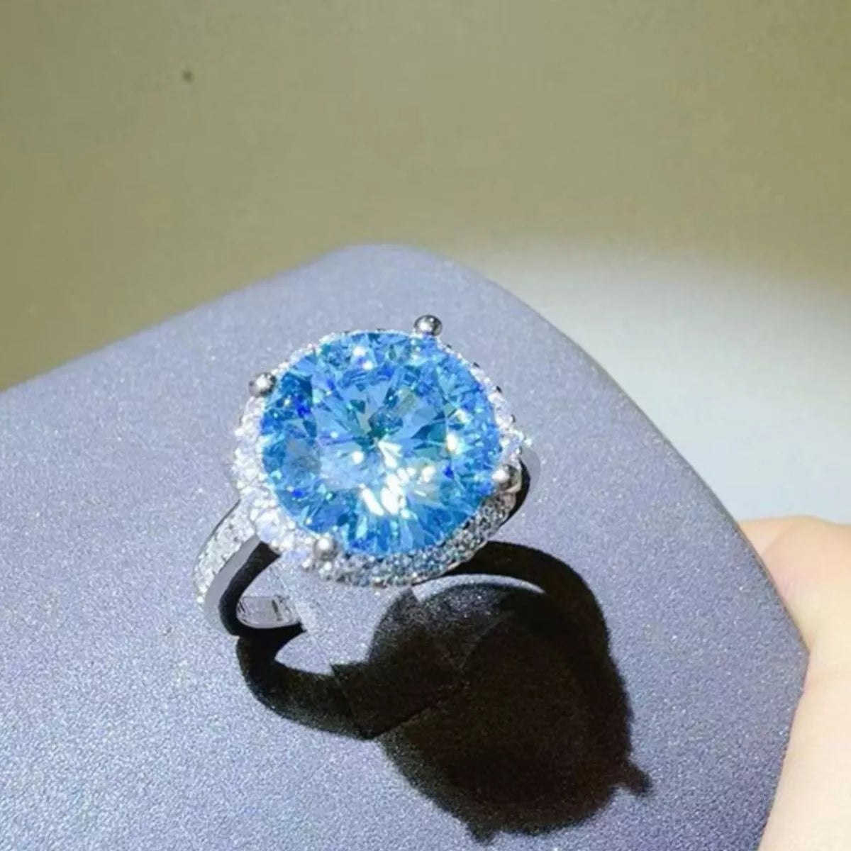 Adjustable sterling silver ring shown worn on the hand