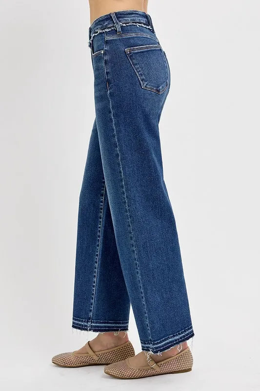 Dark wash bootcut jeans side view