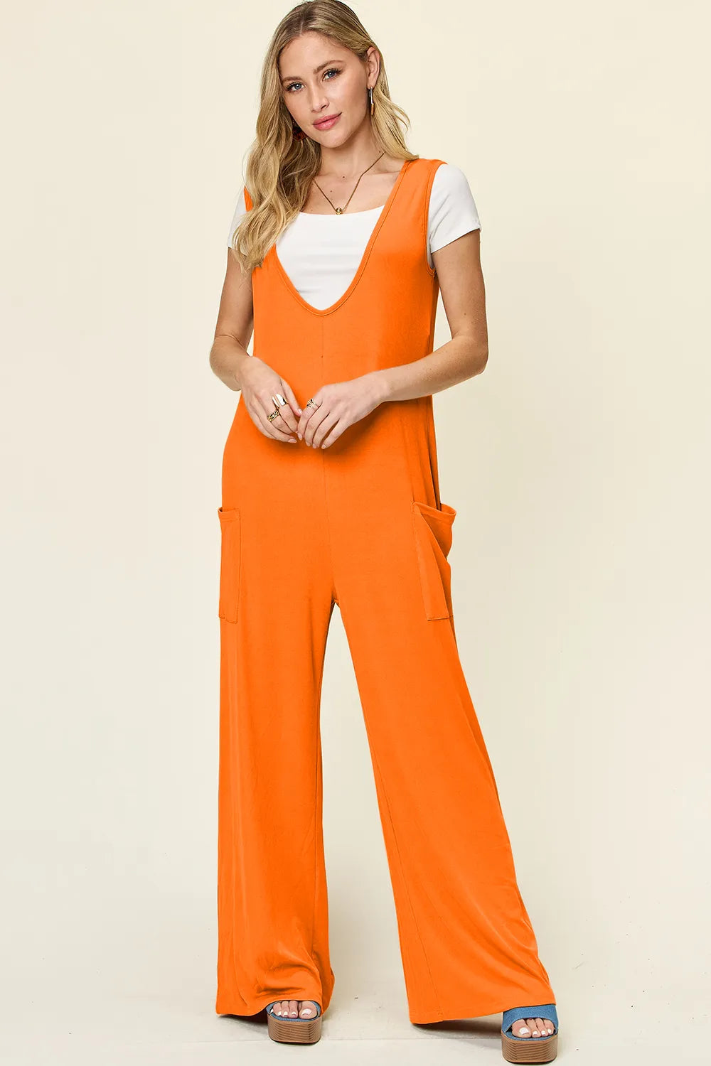 Full outfit view of the opaque wide leg jumpsuit