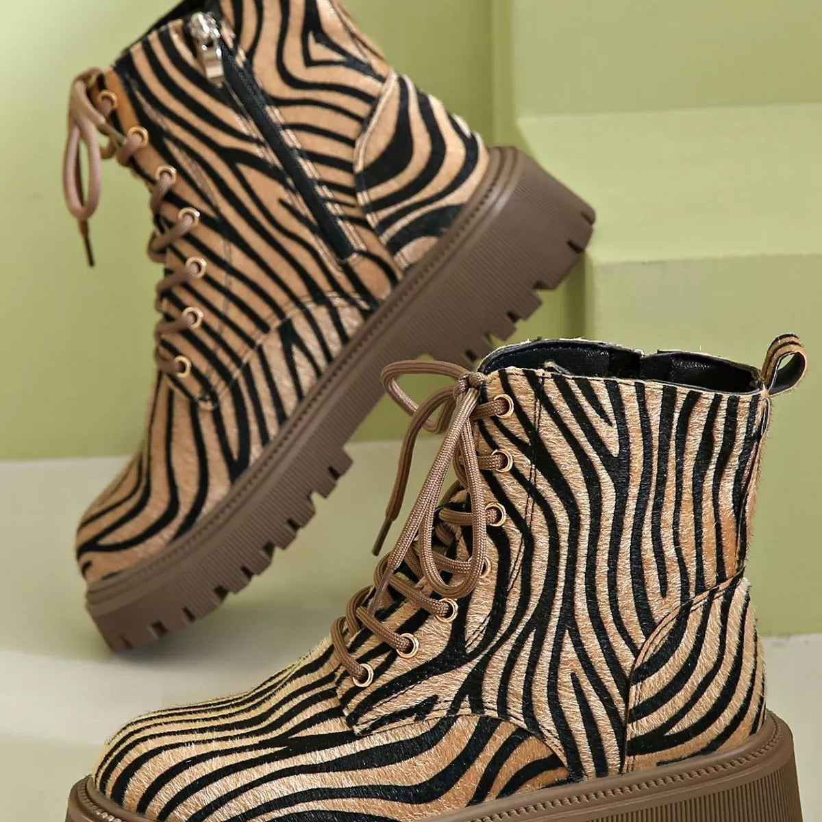 Animal print lace up ankle boots heel close up