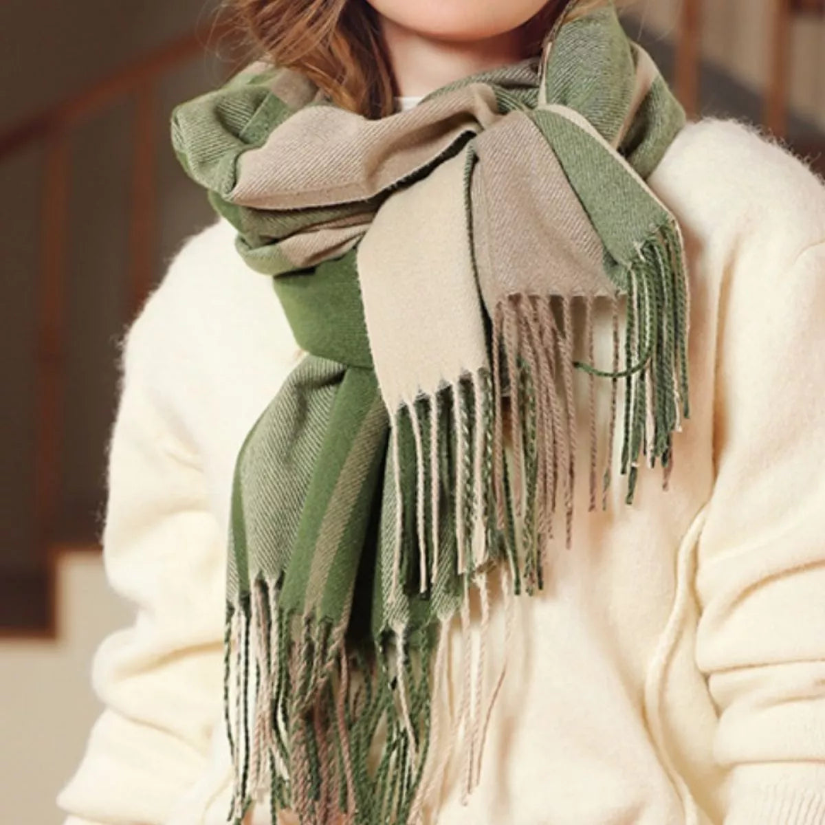 Plaid scarf shown in a warm earthy color mix