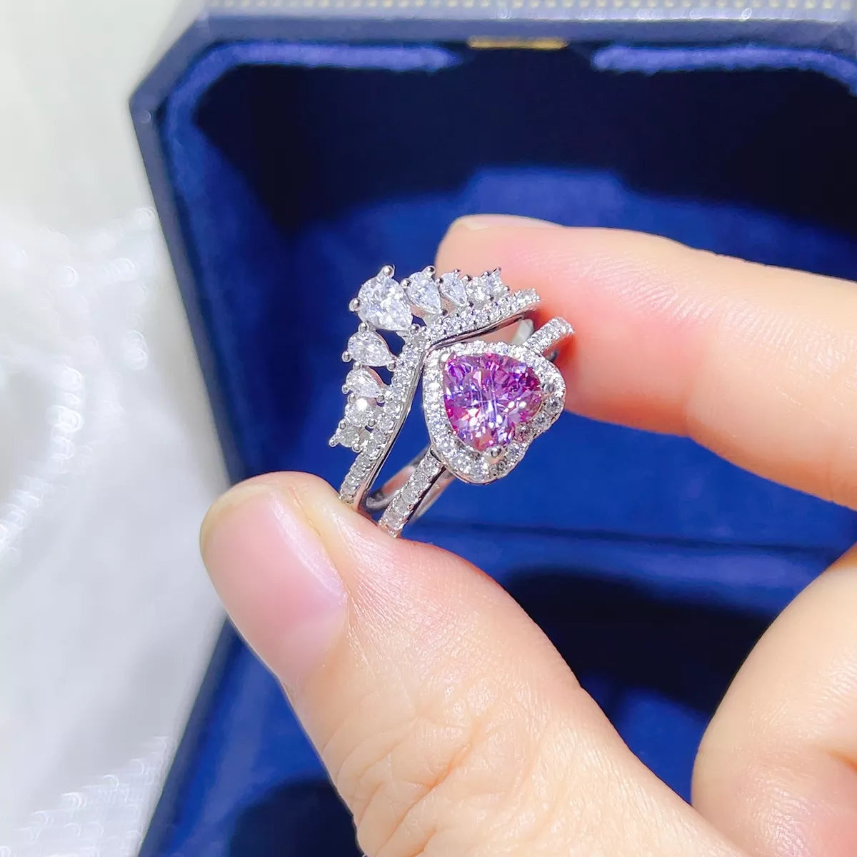 Close up of moissanite stone and silver setting detail