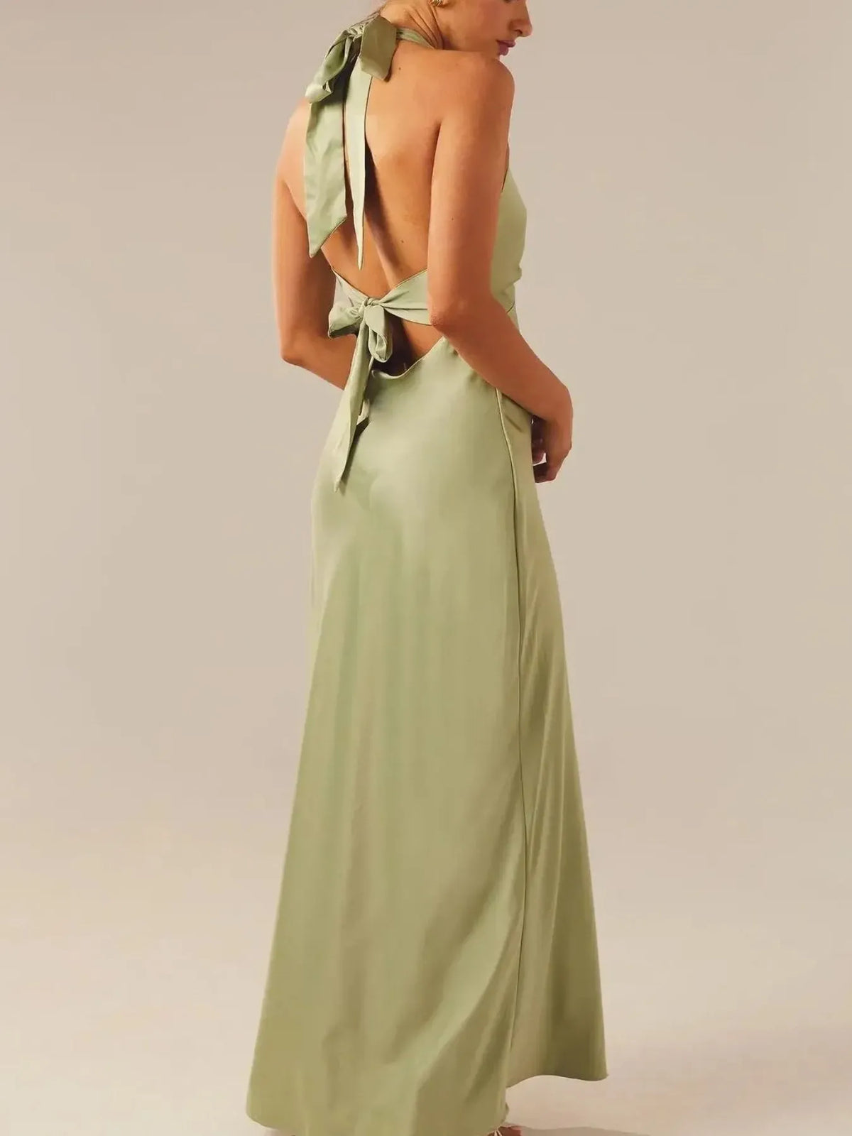 Halter neck wrap maxi dress with tie detail side view
