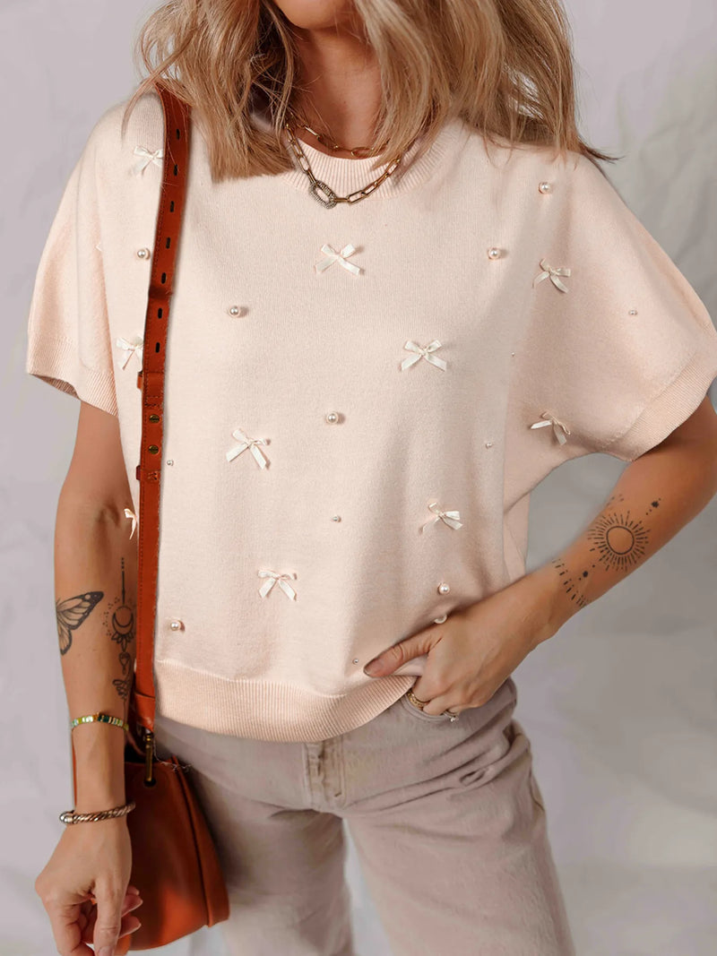 oatmeal pearl bow short sleeve sweater front view