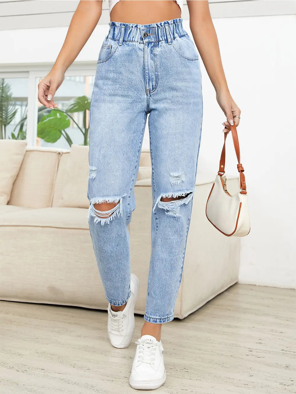 Distressed high waist jeans front view
