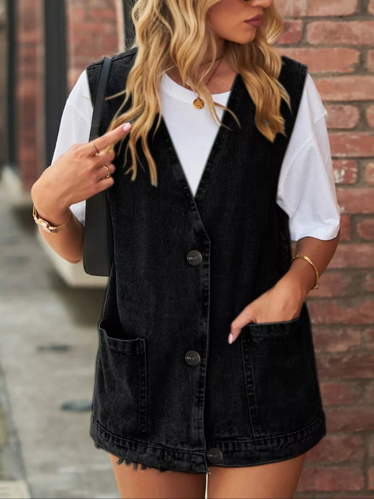 Sleeveless Button Down Denim Vest in Light Blue close up