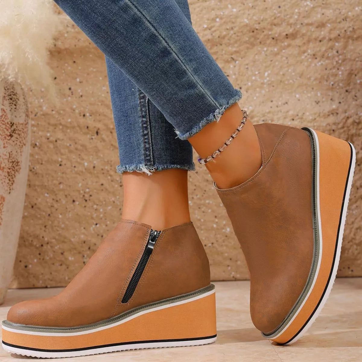 Wedge boots fastening detail