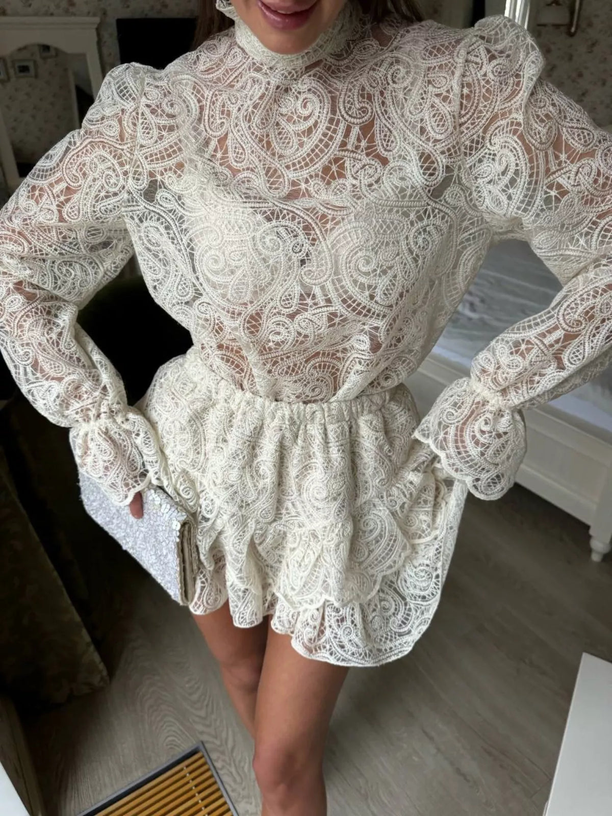 Sheer lace coordinated top and skirt set styled