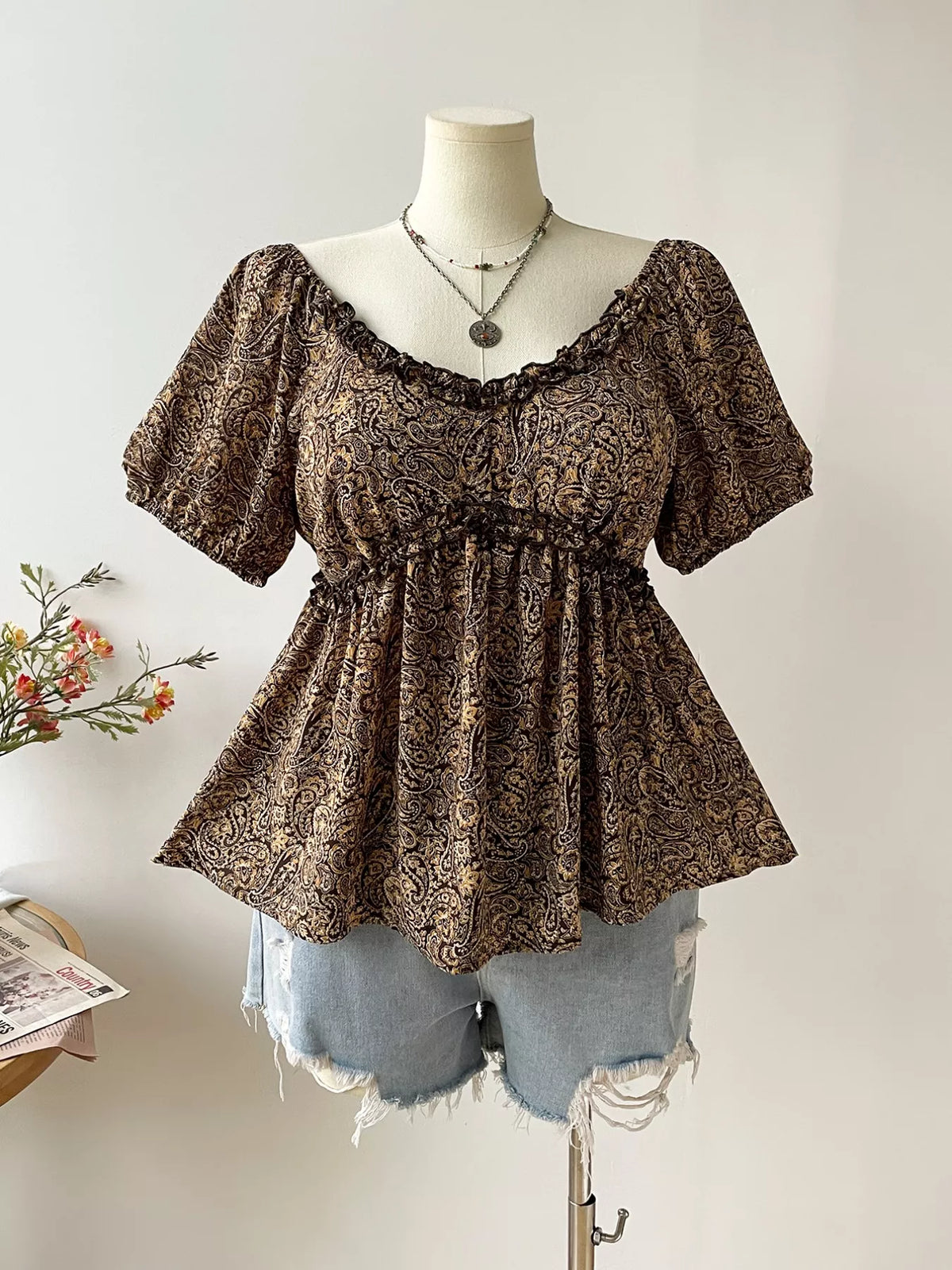 Paisley blouse neckline and print detail