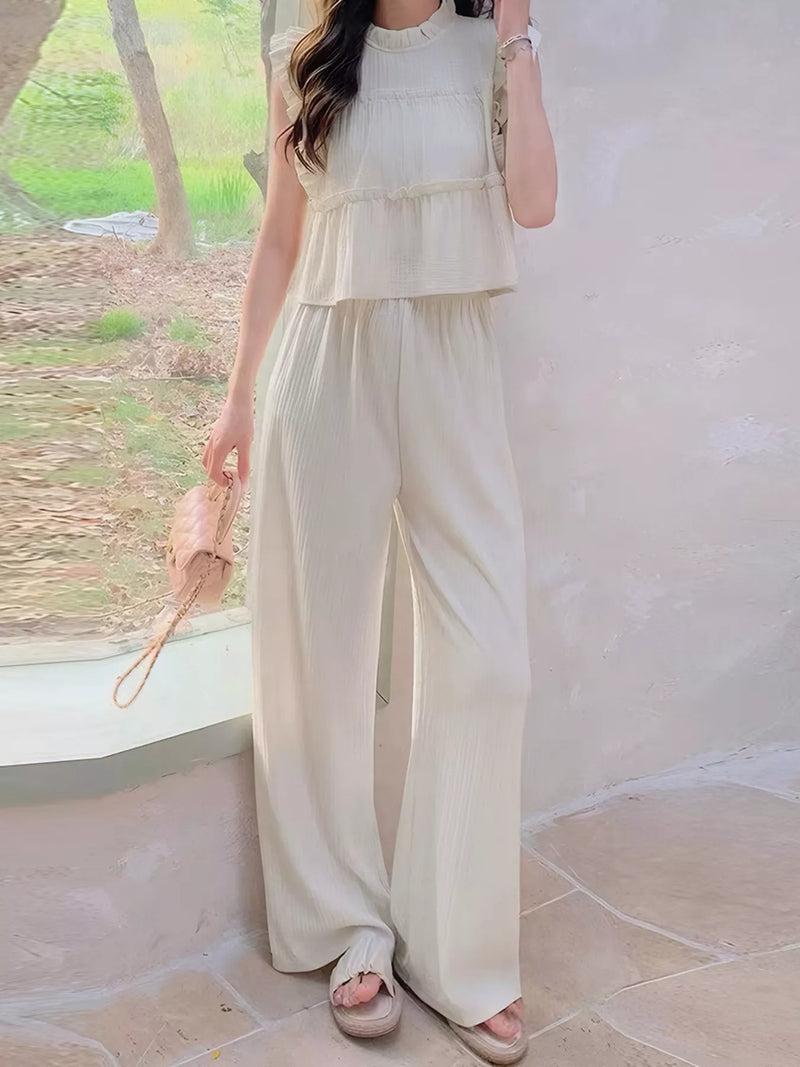 Ruffled sleeveless top and wide leg pants set in apricot