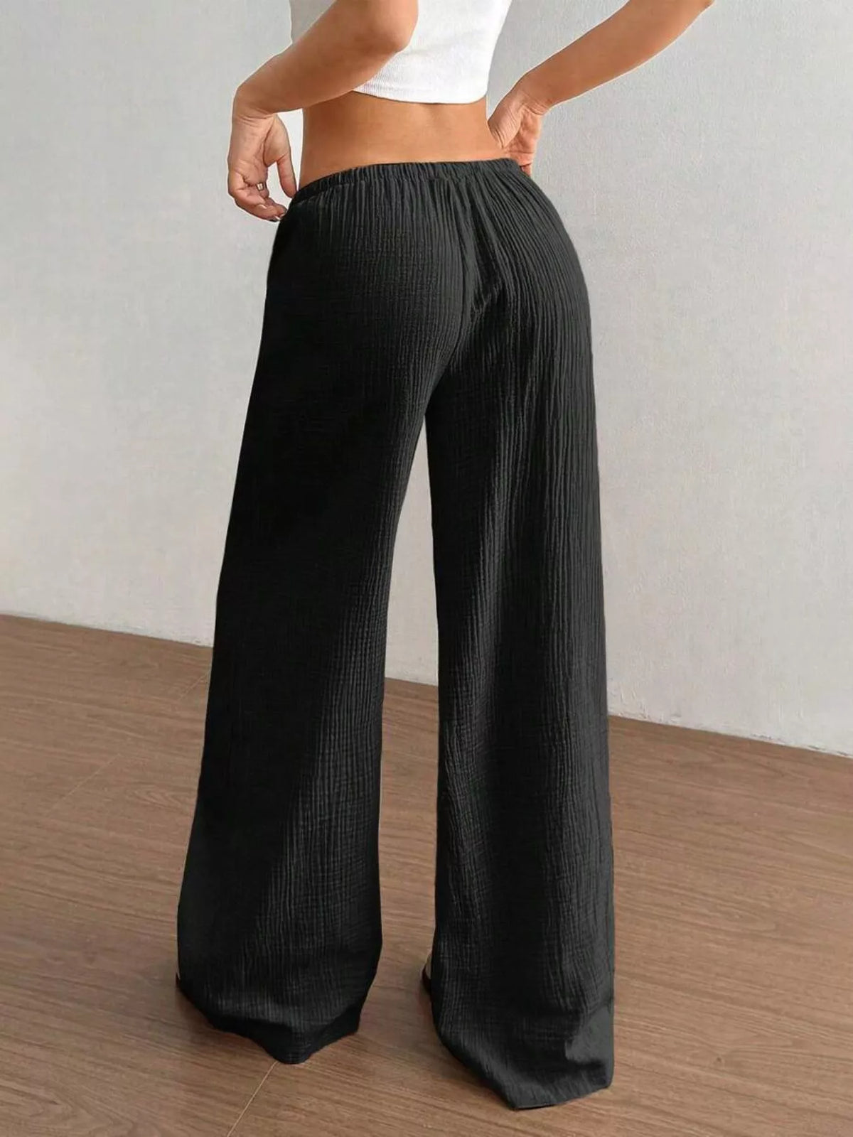 Relaxed cotton trousers styled for a warm day