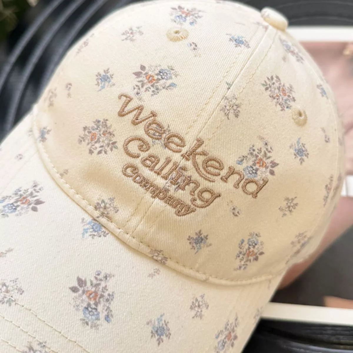 Close up of the floral print on the cap panels