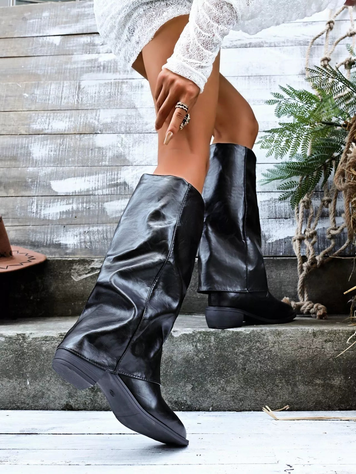 Pointed toe block heel boots upper close up