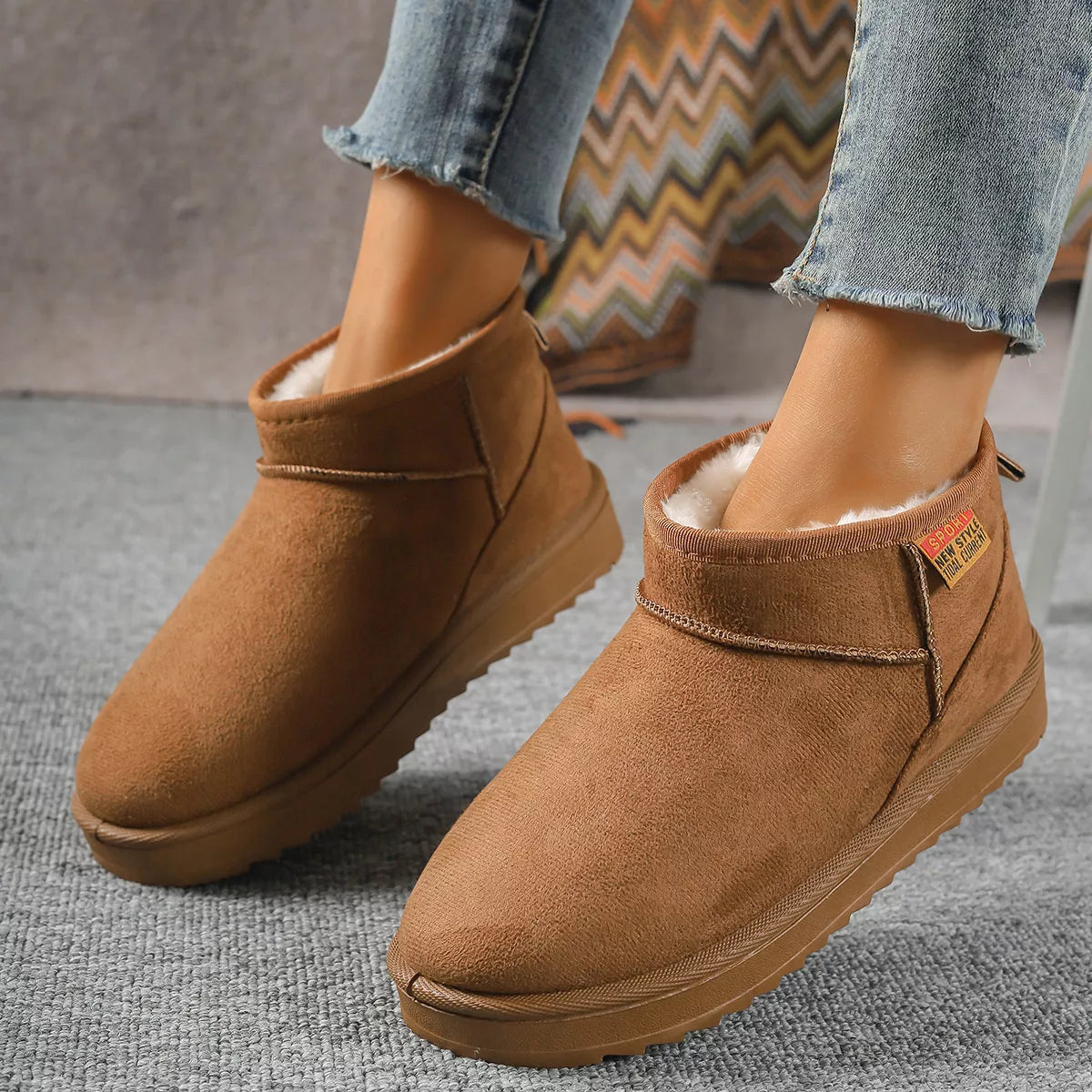 Black round toe platform boots angled three quarter view