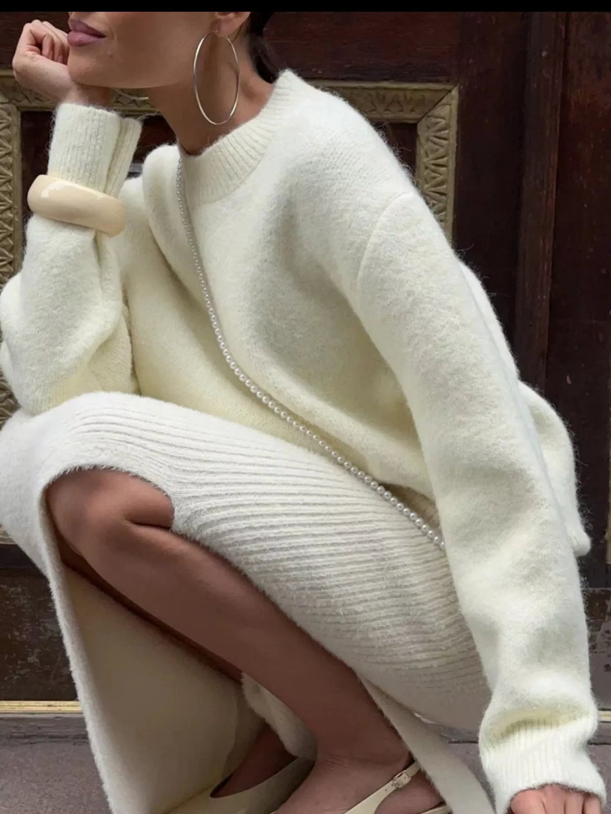 round neck dropped shoulder sweater knit texture close up