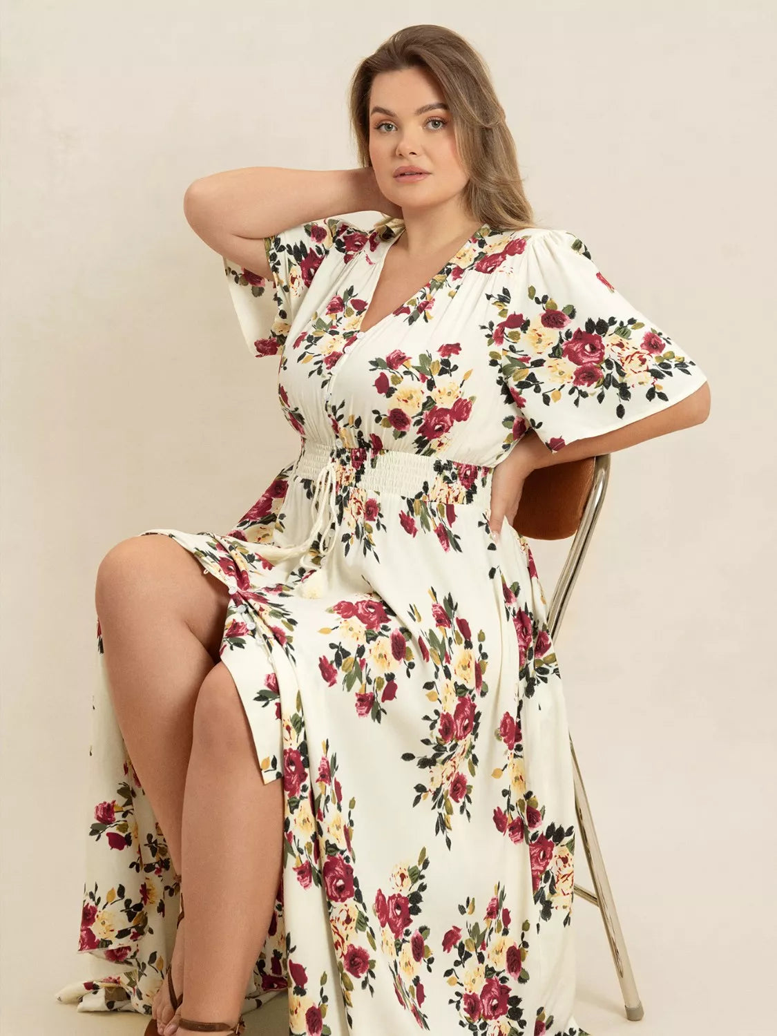 Pastel yellow floral flutter sleeve button front maxi dress side view