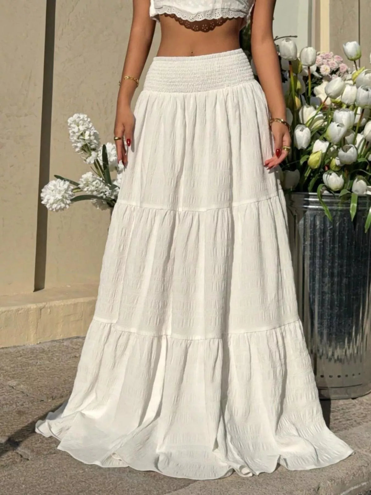 White smocked tiered maxi skirt front view