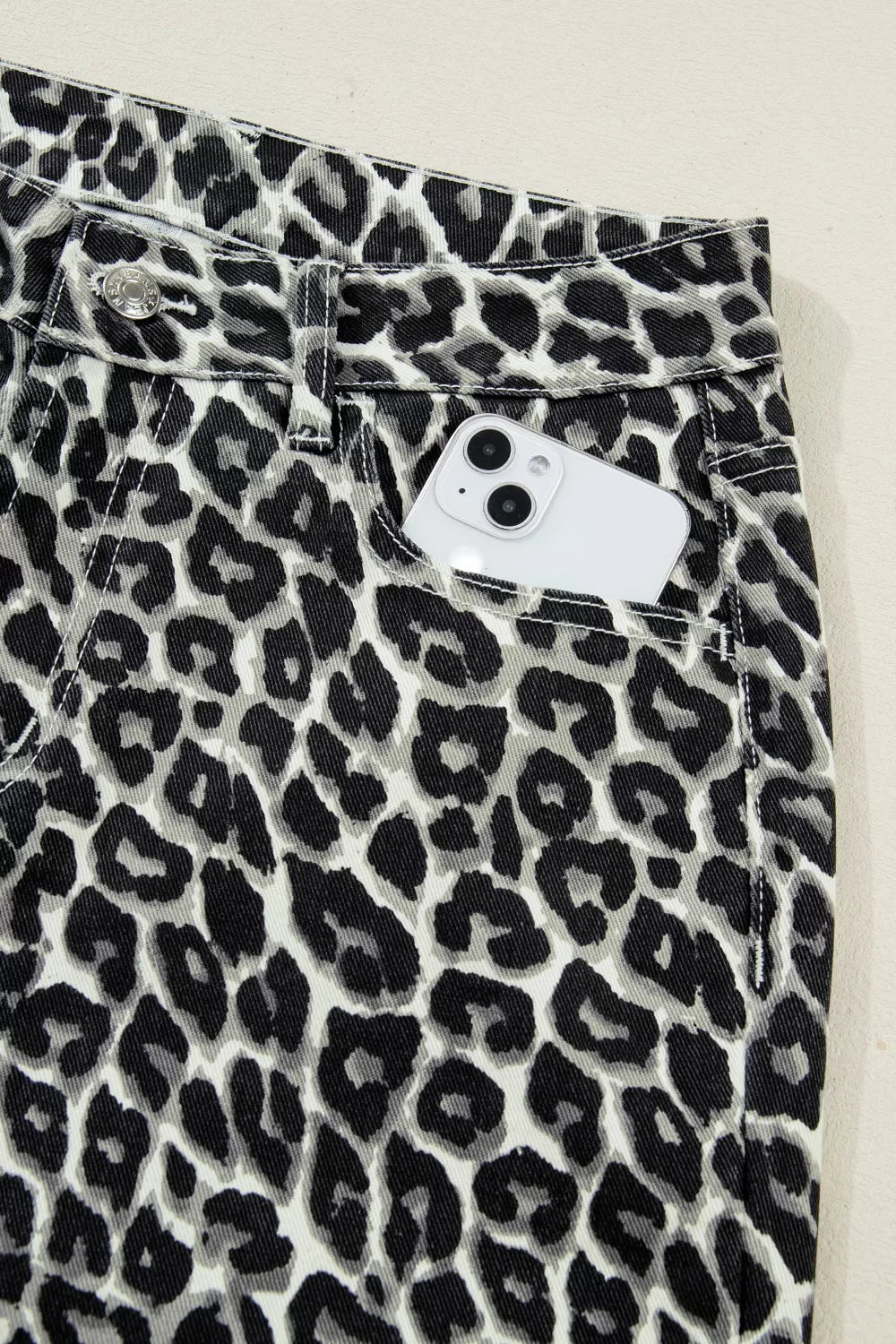 Detail of pocket on barrel jeans