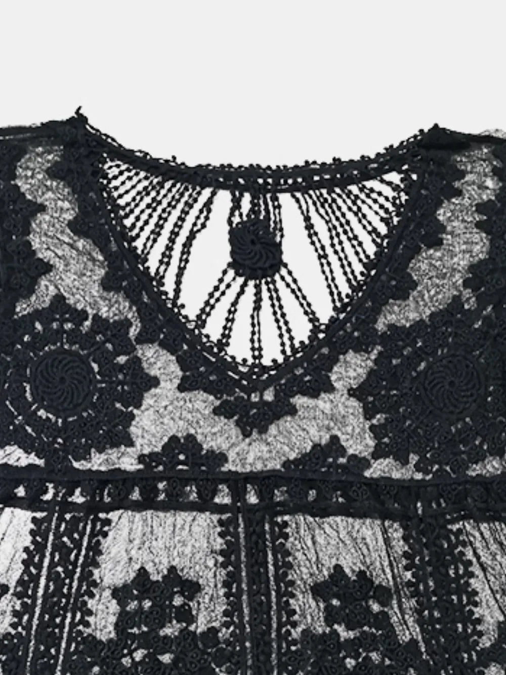 Lace cover up styled over swimsuit