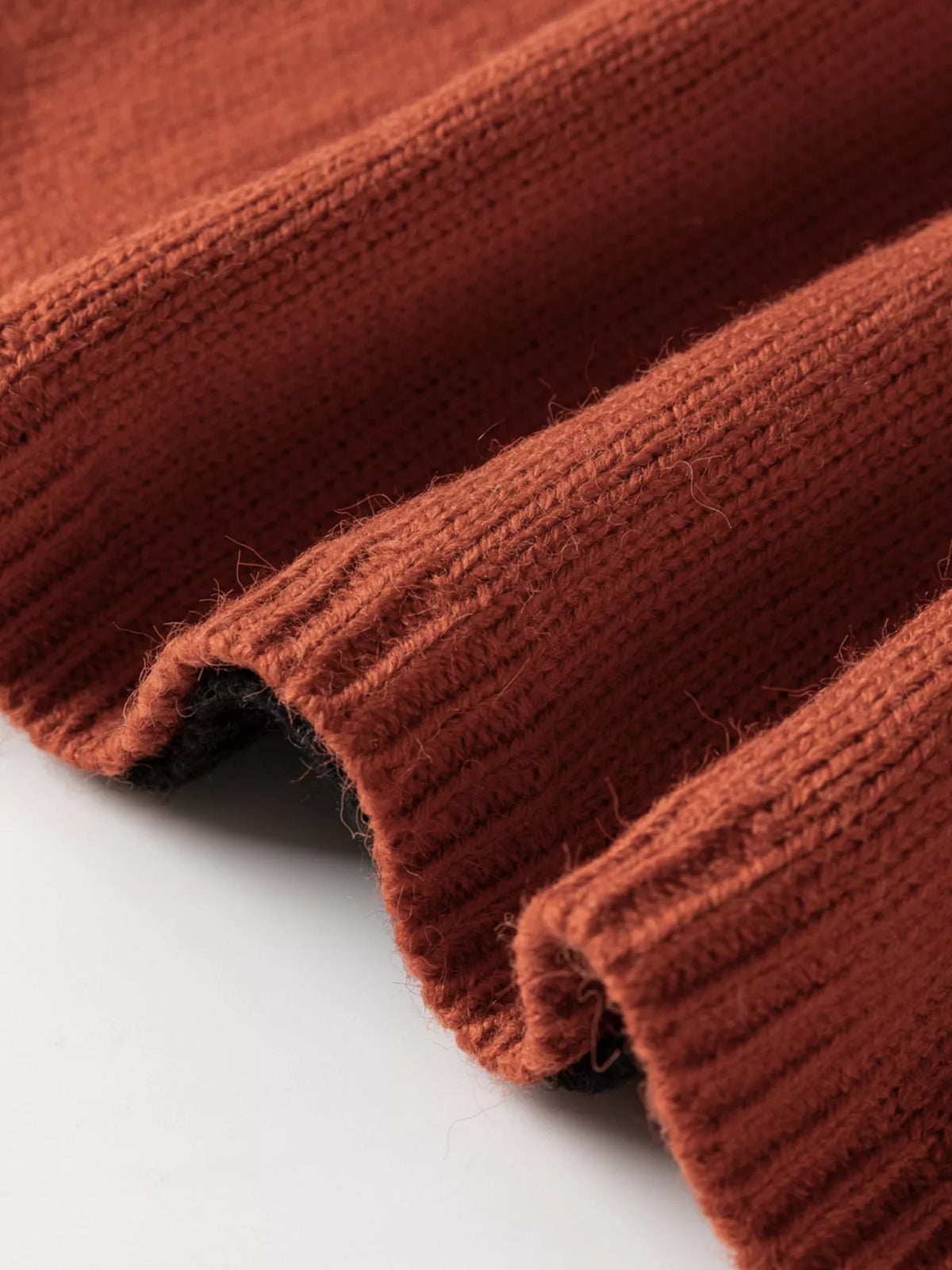 Caramel color block turtleneck drop shoulder sweater front view