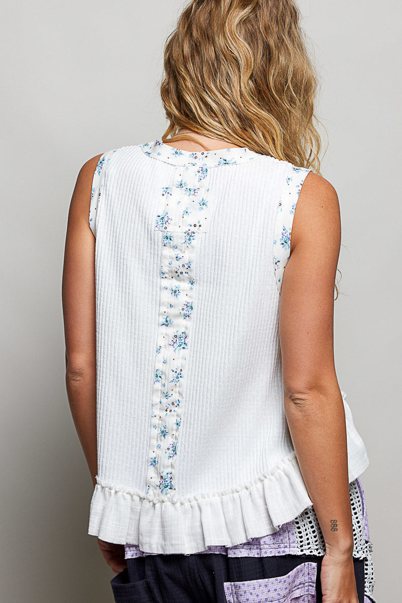 Ribbed tank close up of the double gauze ruffle accent