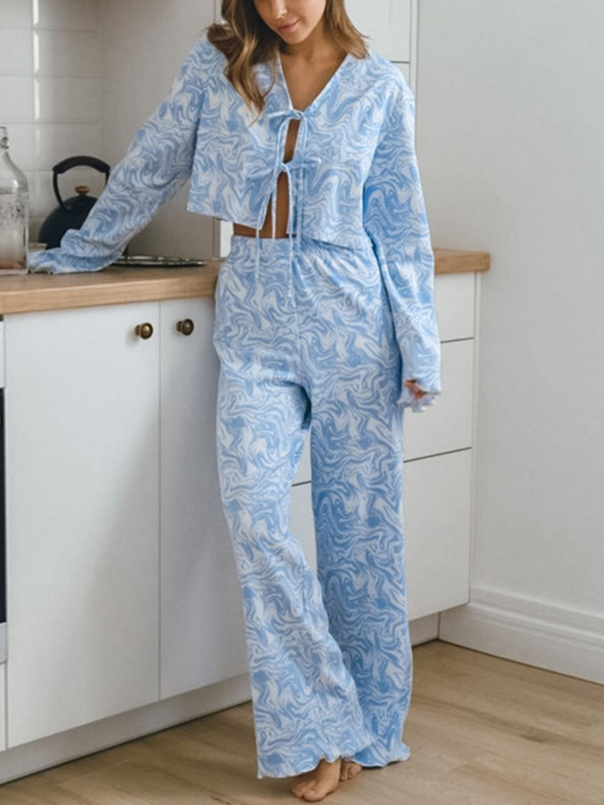 Tie front long sleeve top and pants lounge set in light blue front view