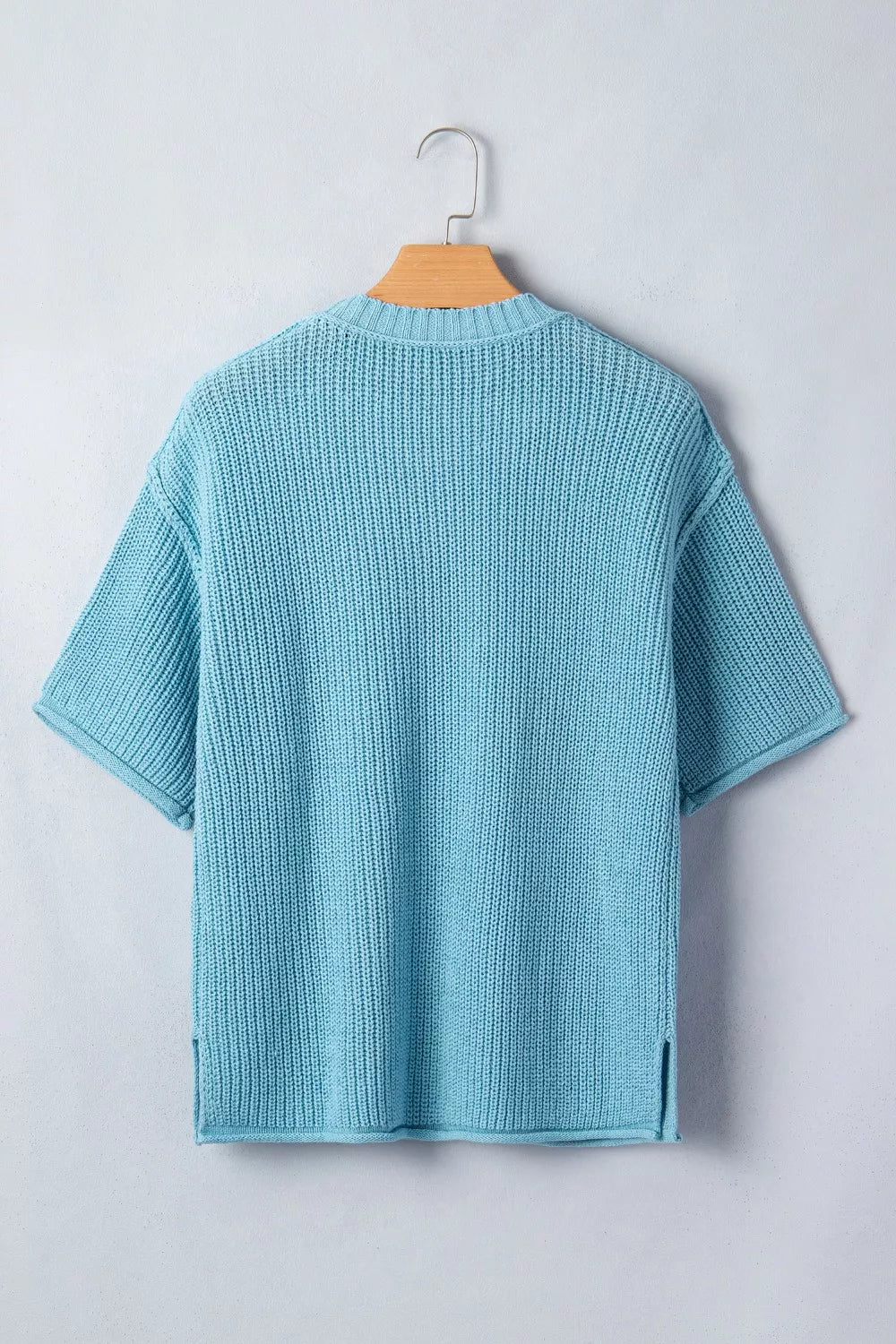 Casual pastel blue sweater styled for everyday wear