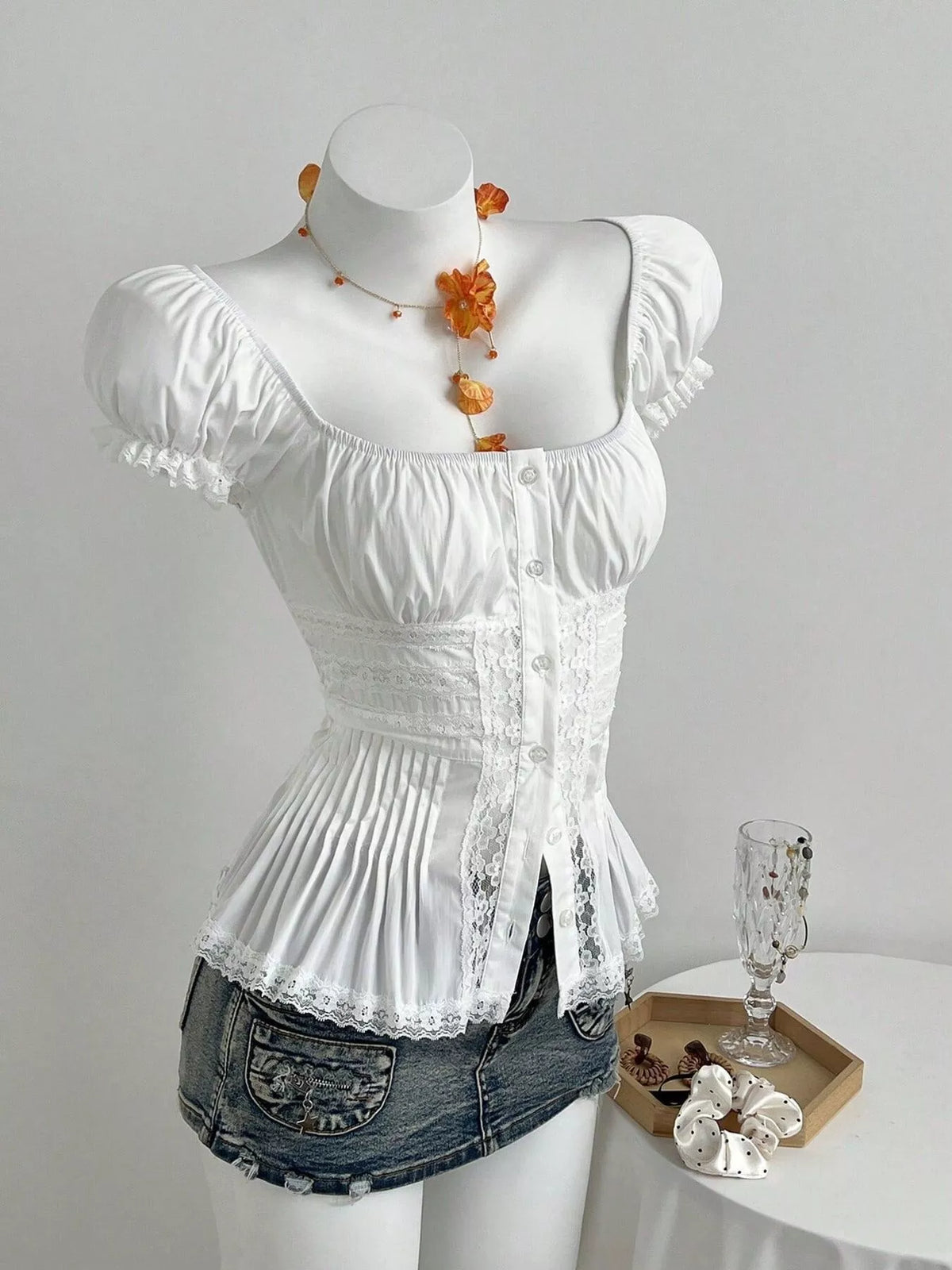 Ruching and short sleeve detail on the shirt
